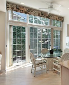 Gorgeous patio doors flanking large living room.