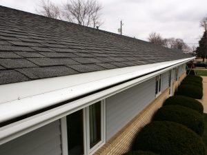 Covered gutter system installed on Nebraska home.