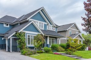 A Home Exterior With Attractive Blue Siding 