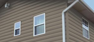 Closeup of home with steel log siding.