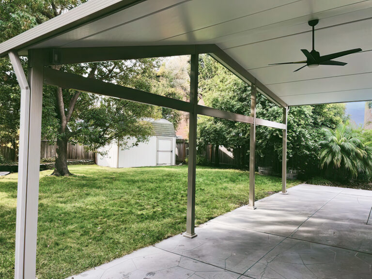 interior of cathedral style patio cover in white color