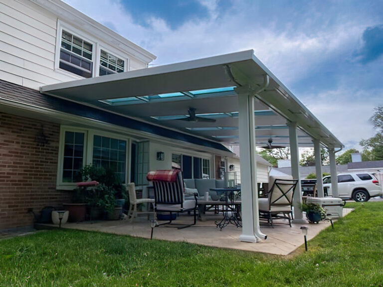 patio cover with glass panels allowing for light to enter