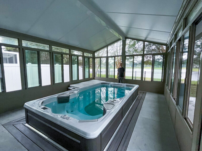 sunroom used to enclose hot tub installed by sunrooms omaha company