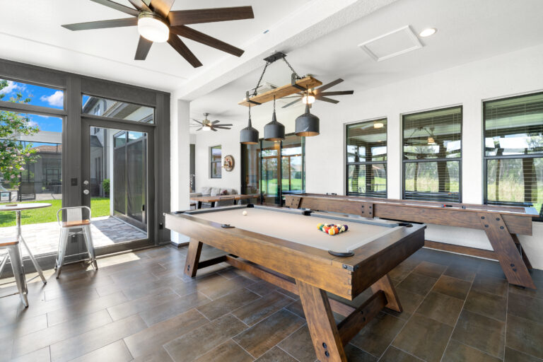 omaha Sunroom with ceiling fans and billiards table