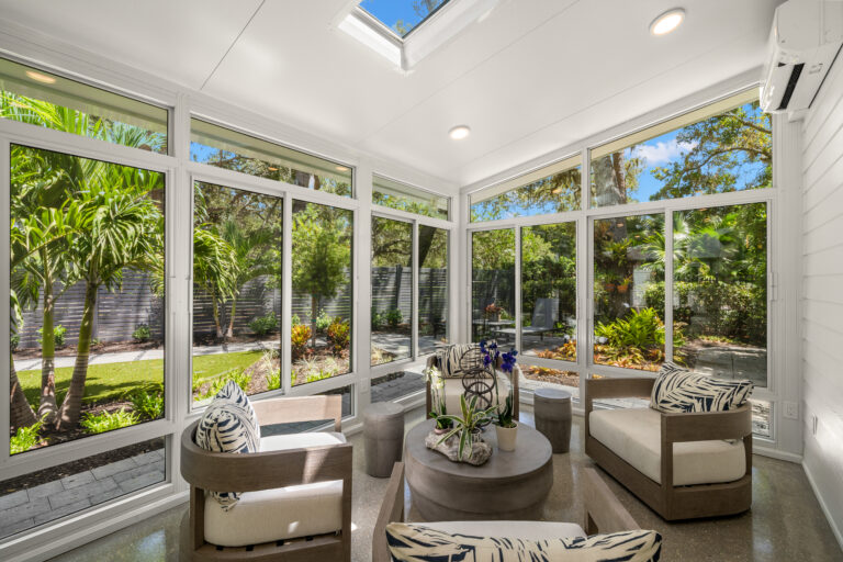 interior of beautiful Omaha sunroom with staged furniture
