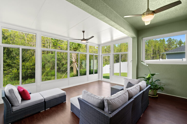 Omaha sunroom interior with furniture and ceiling fan