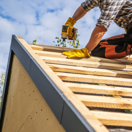Douglas County roofing contractor installing metal shingles